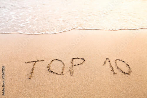 top 10, sign on the sand beach