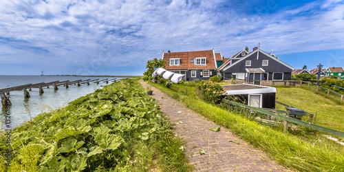 Photography typical fishing village houses in Rozewerf on Marken island with