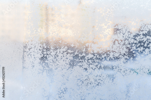variety of frost patterns on a winter window