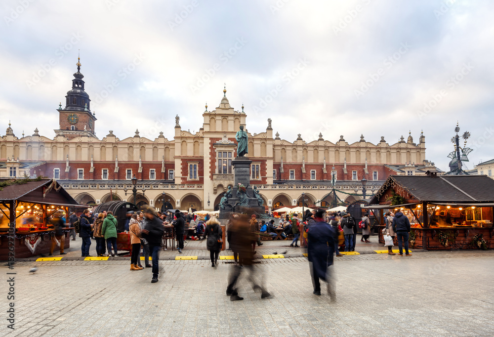 Fair in KRAKOW. Main Market Square and Sukiennice in the evening.