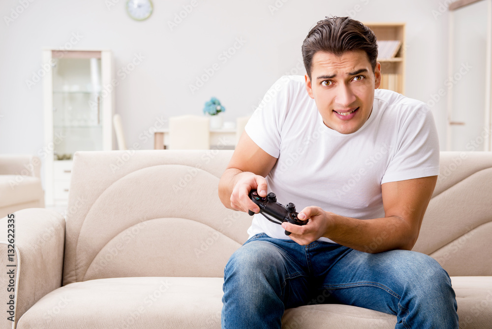 Fototapeta premium Man addicted to computer games