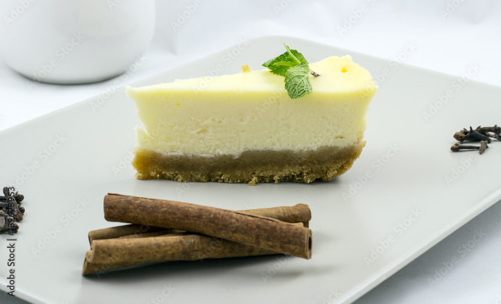 White chocolate cheesecake with mint and cinnamon