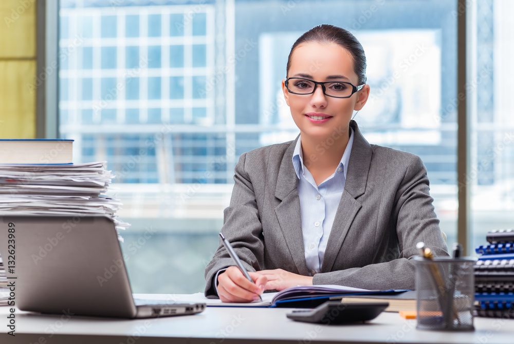 Young businesswoman working in the office Young businesswoman working in the office