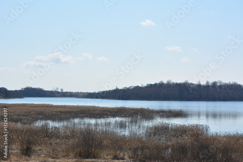 a beautiful lake in the spring, nature, wilderness, horizontal landscape, landscape orientation 