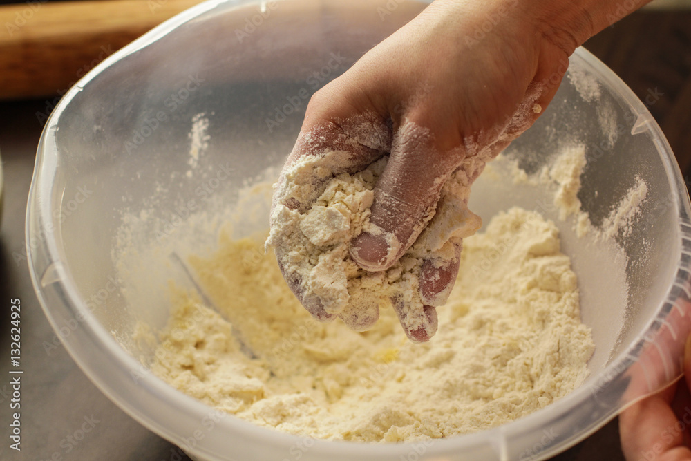 Mixing fresh dough mix with the hands Mixing fresh dough mix with the hands