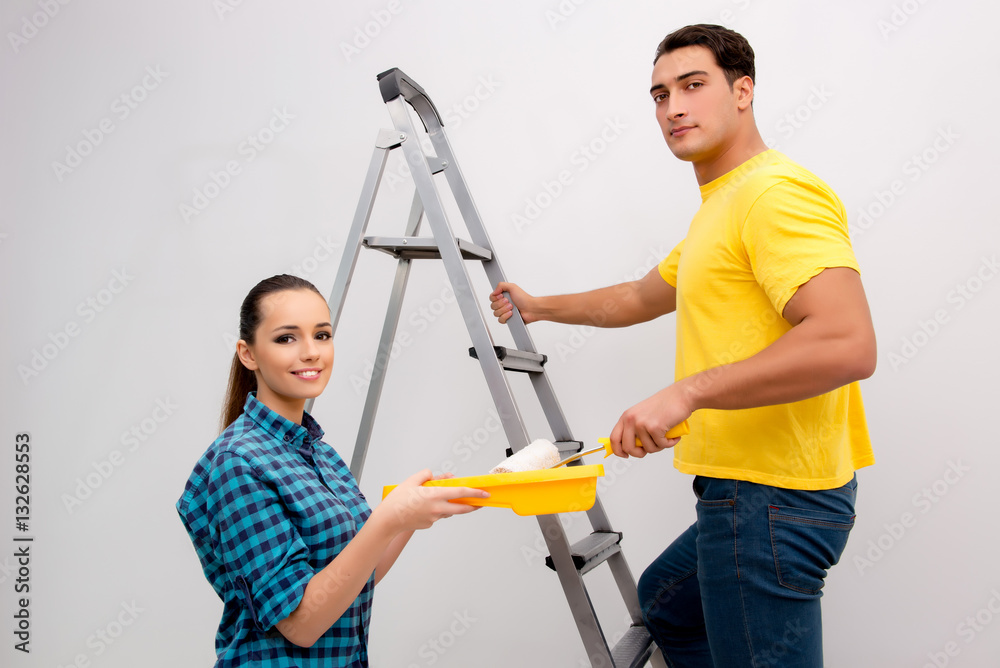 Wife and husband family doing home improvements
