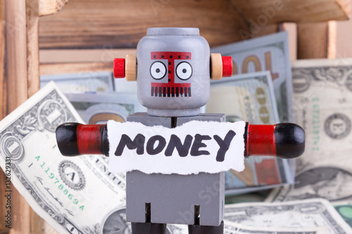 MONEY word with standing robot