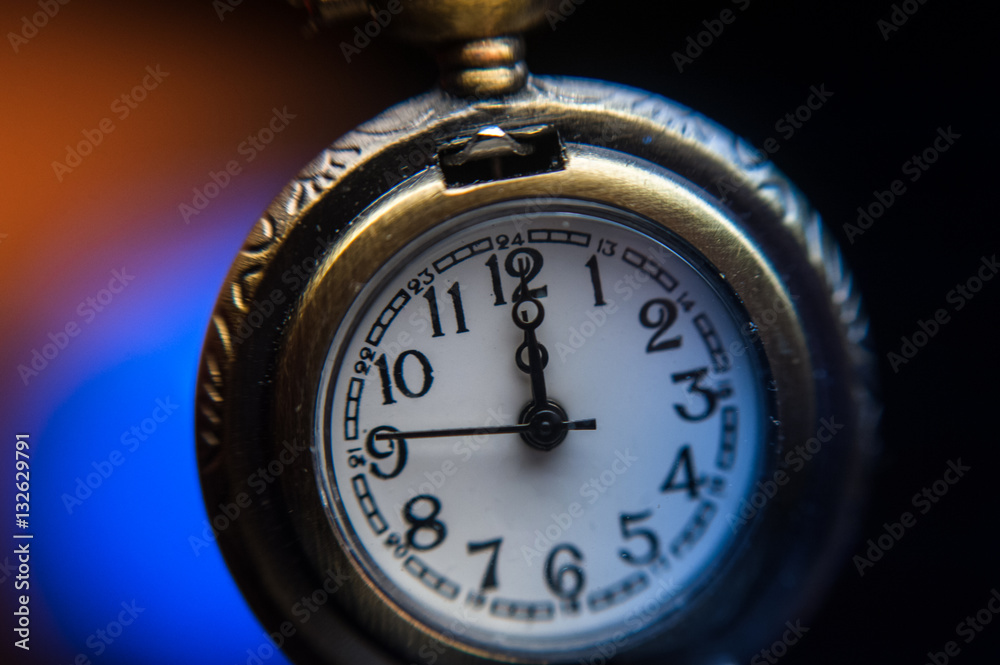New year clock on abstract color background New year clock on abstract color background