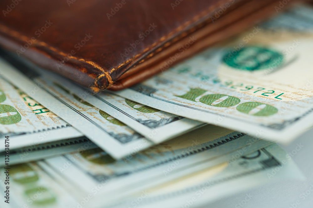 Brown leather wallet with USA dollars money Brown leather wallet with USA dollars money