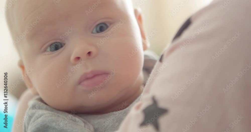 Newborn baby in mother's hands close up. Newborn baby in mother's hands close up.