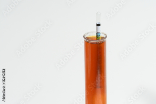 home brewbeer hydrometer focused on the word beer photo