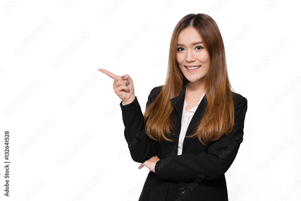 Young beautiful Asian businesswoman pointing something on white background. Image with clipping path. Young beautiful Asian businesswoman pointing something on white background. Image with clipping path.