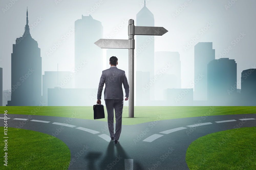 Businessman in difficult choice concept