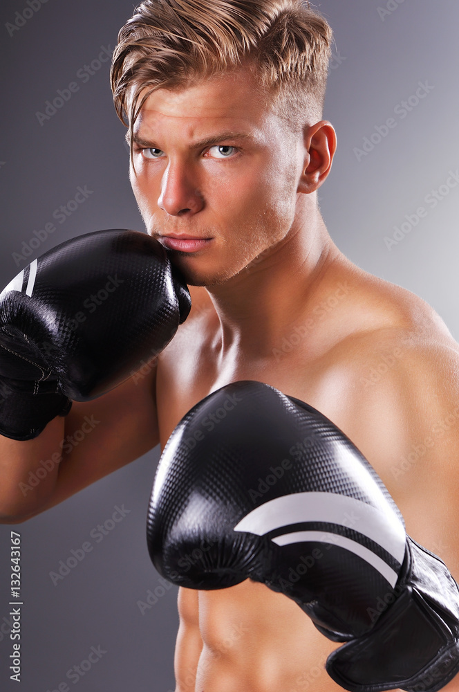 Portrait of Handsome Muscular Fighter Practicing. Concept of Healthy Lifestyle. Portrait of Handsome Muscular Fighter Practicing. Concept of Healthy Lifestyle.