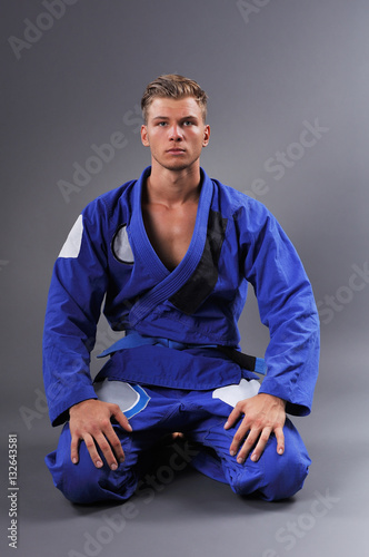 Portrait of Handsome Muscular Jiu Jitsu Fighter Posing. Concept of Healthy Lifestyle.