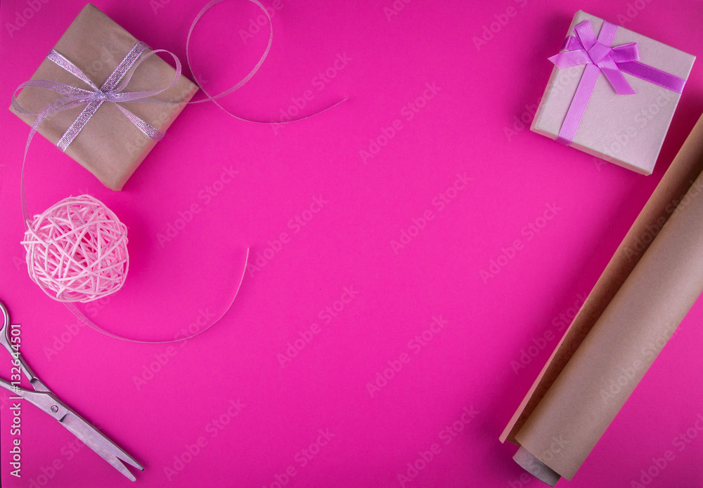 Valentines day gift wrapping on pink background.