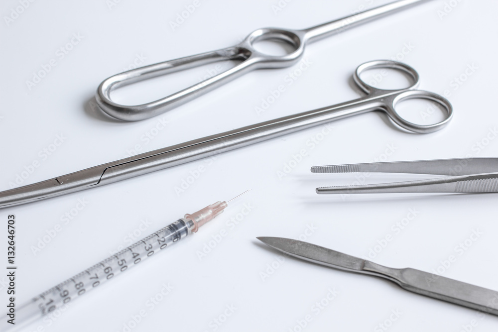 instruments for plastic surgery on white background instruments for plastic surgery on white background