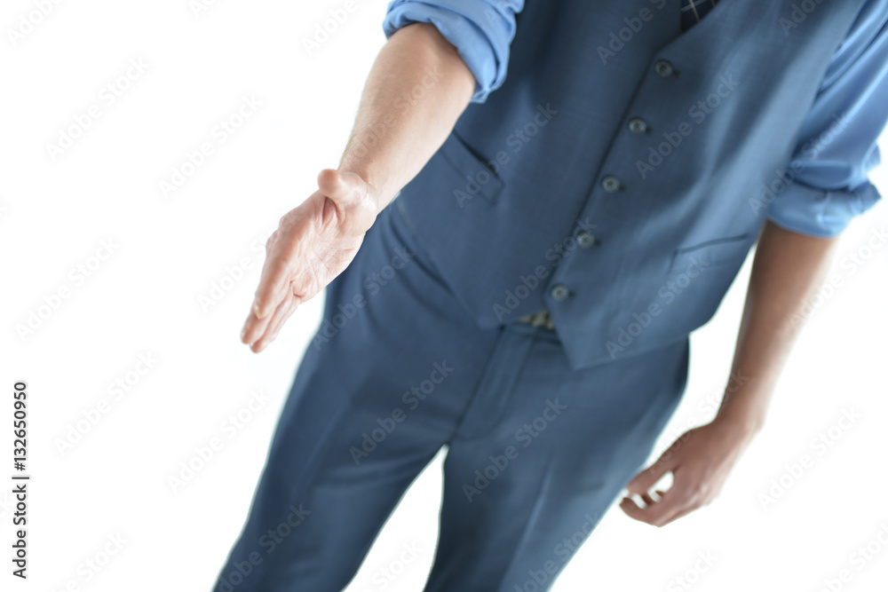 Business man holding out hand for a hand shake