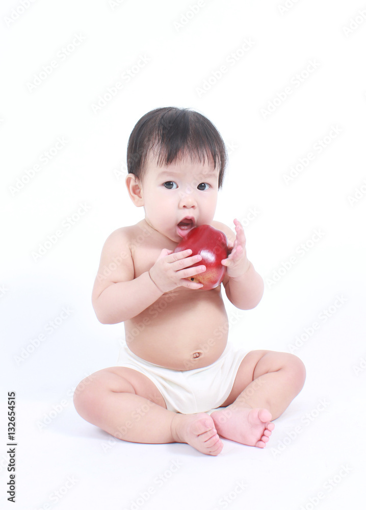 Cute baby with red apple (eating healthy food) Cute baby with red apple (eating healthy food)