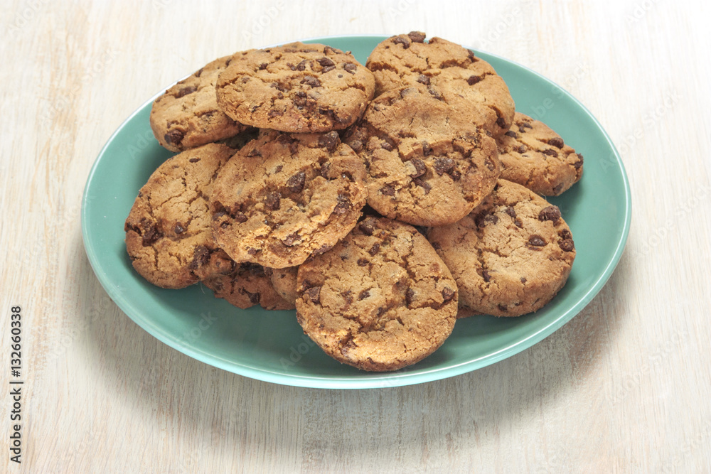 Chocolate chips cookies on plate with copyspace Chocolate chips cookies on plate with copyspace