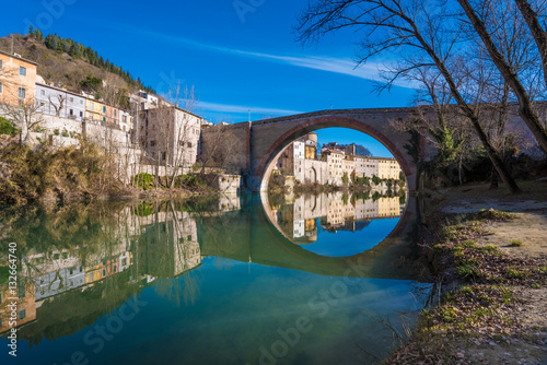 Tableau sur toile Fossombrone (Italy), a town with river bridge in Marche region