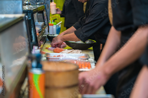 Photography Chef making sushi