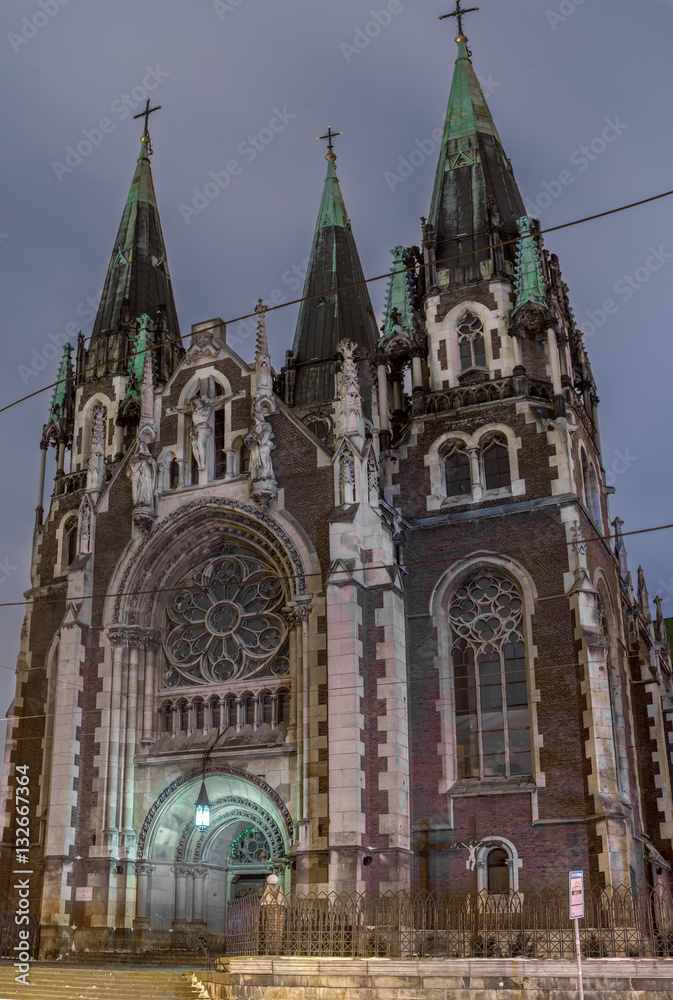 Ancient monument - facade of Gothic church in evening