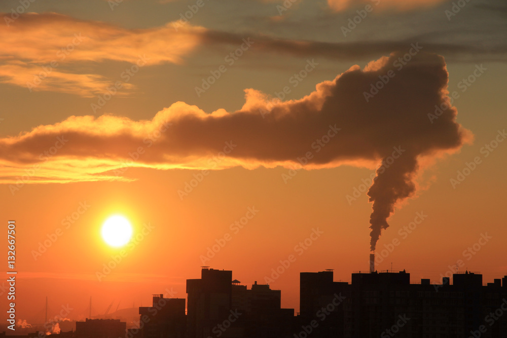 Plakat Smoke from industrial chimneys at dawn