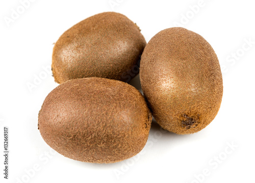 Whole ripe kiwis isolated on a white background