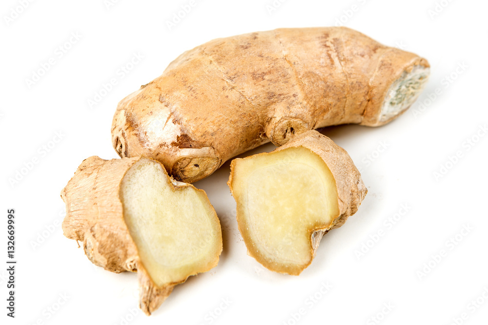 Sliced ginger root with a heart shape isolated on a white background Sliced ginger root with a heart shape isolated on a white background
