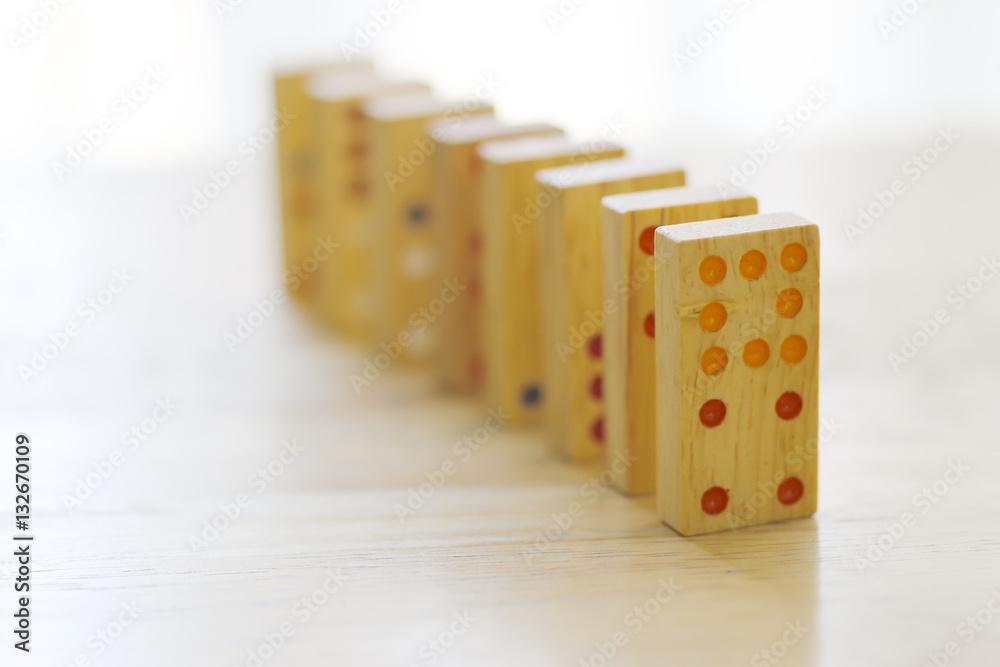 Stock Photo:.Set of wooden domino. Concept of solution and domin Stock Photo:.Set of wooden domino. Concept of solution and domin