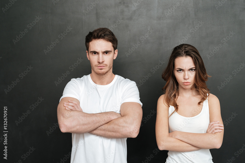 Offended young couple in studio Offended young couple in studio