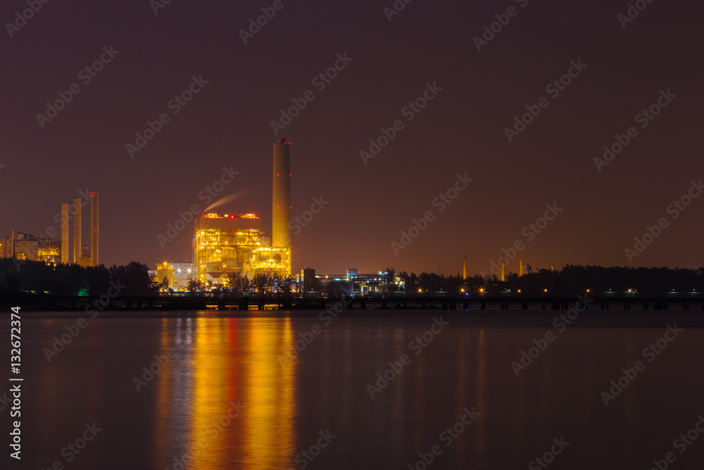 electrical power plant near sea coat at night, Rayong, Thailand