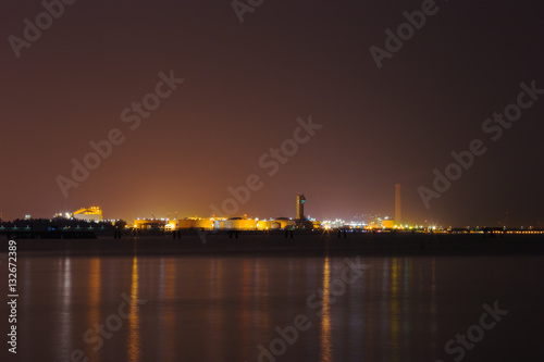 electrical power plant near sea coat at night, Rayong, Thailand