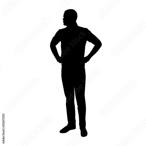 Young man is standing with hands on hips vector silhouette