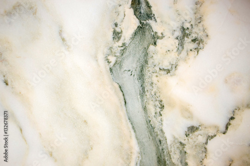 Lightened slices marble onyx. Horizontal image. Warm green colors. Beautiful close up background © wedphoto