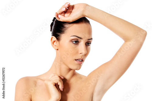 Beautiful woman face close up studio. Isolated on white.