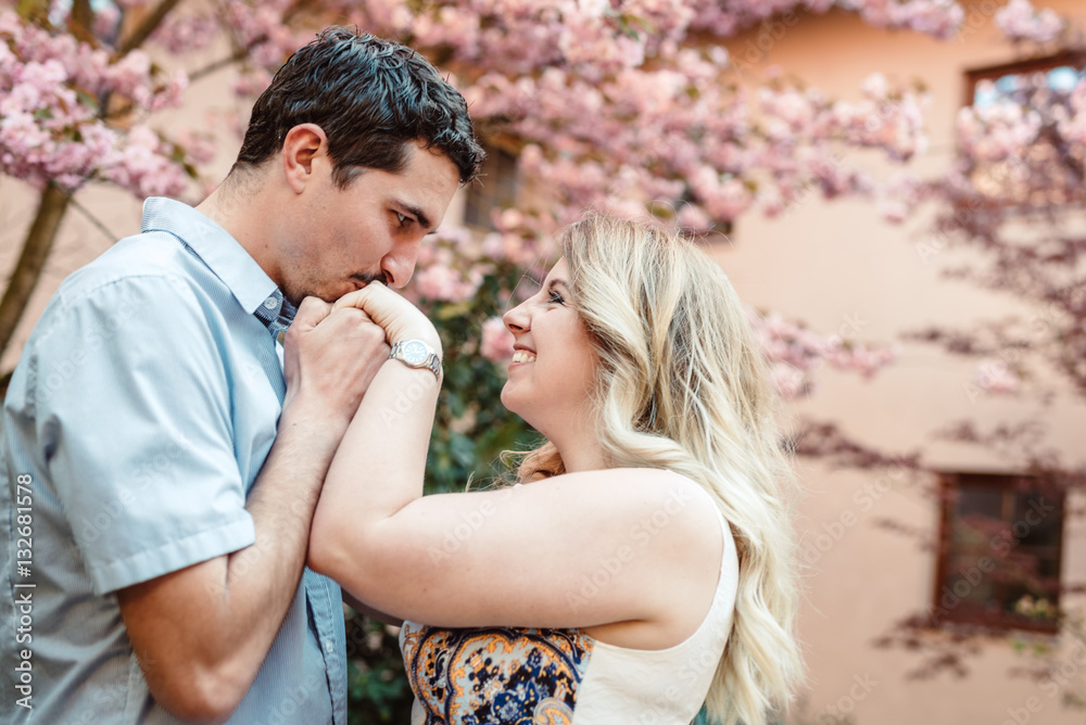 Fototapeta premium Hand kiss for his girl friend