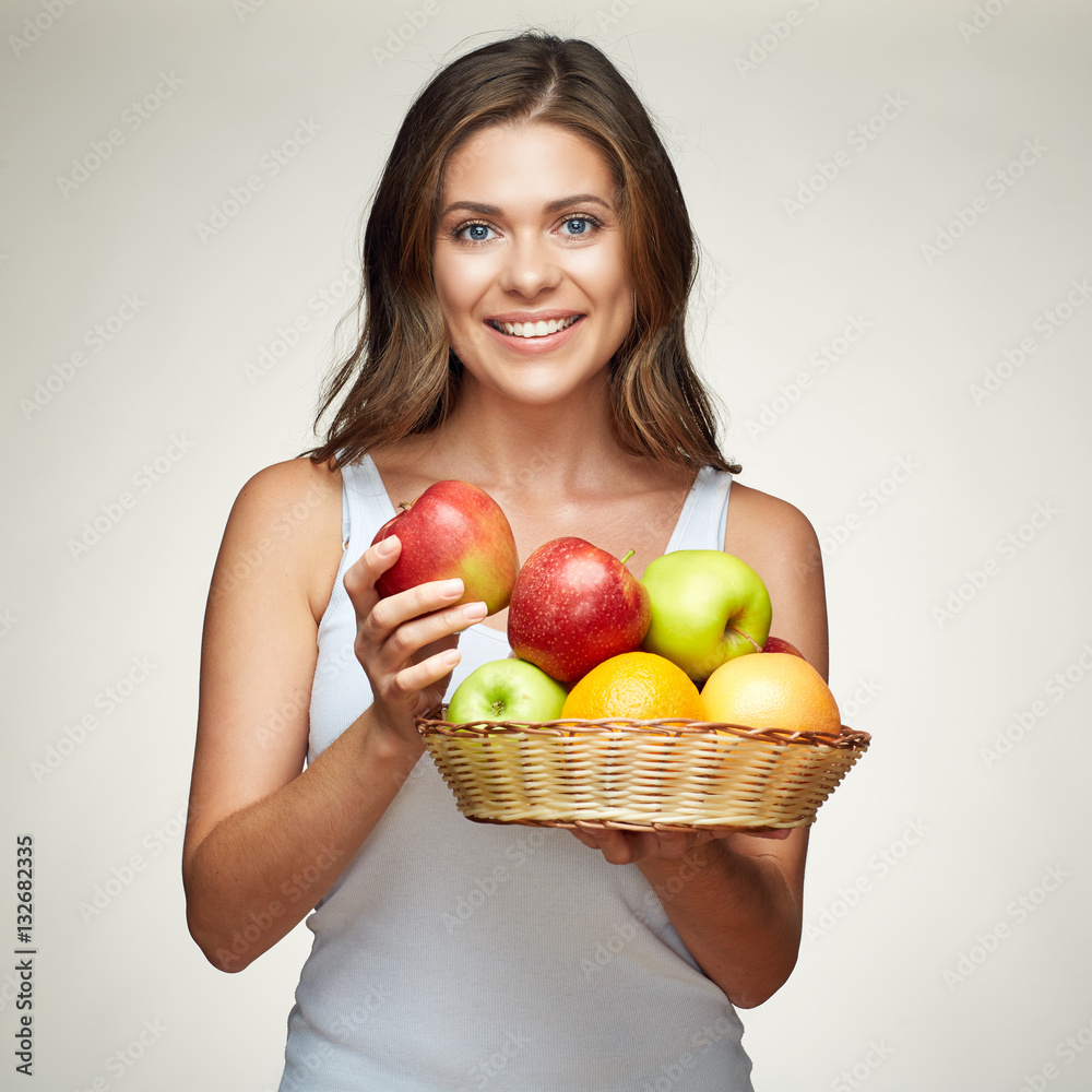 smiling woman holding fruit set. red, green apples. oranges. smiling woman holding fruit set. red, green apples. oranges.