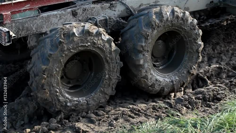 4x4 offroad vehicle is trying to cross the muddy area 4x4 offroad vehicle is trying to cross the muddy area