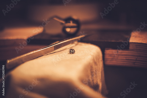 Desktop for craft jewellery making with professional tools photo