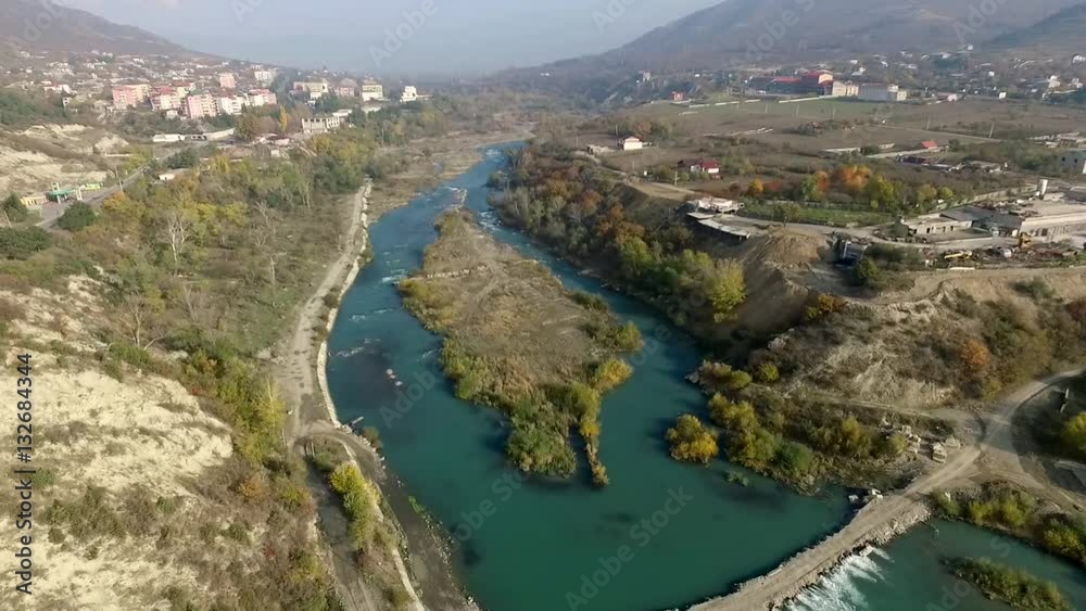 beautiful view of Rioni river and Mtskheta with mountains on the background, Kutaisi, Georgia beautiful view of Rioni river and Mtskheta with mountains on the background, Kutaisi, Georgia
