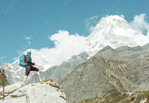 Person travelling in Mountains daylight soft tone with copy space