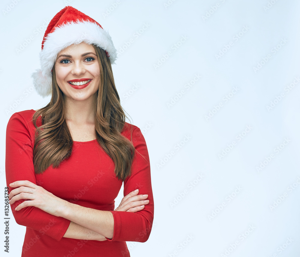 Smiling woman in red dress wearing Christmas Santa hat. Smiling woman in red dress wearing Christmas Santa hat.