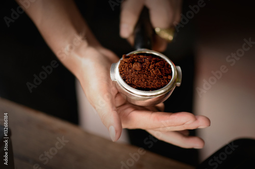 coffee powder in espresso scoop, Barista