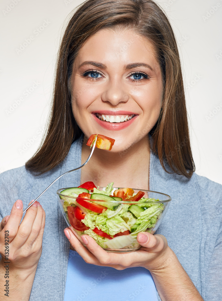 Woman eating salad. Close up face portrait. Woman eating salad. Close up face portrait.