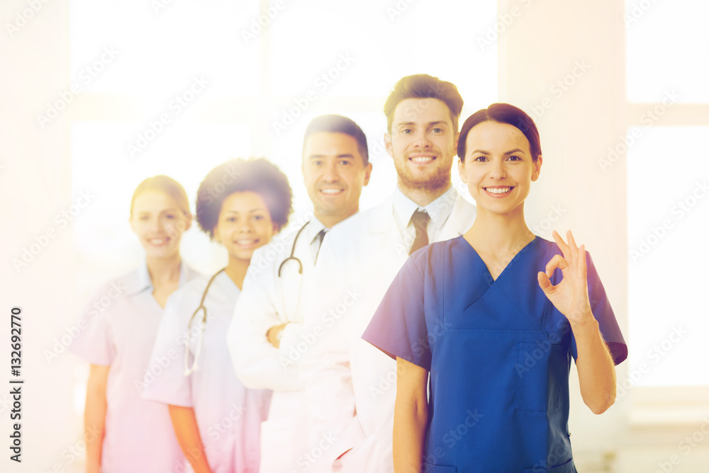 group of happy doctors at hospital group of happy doctors at hospital