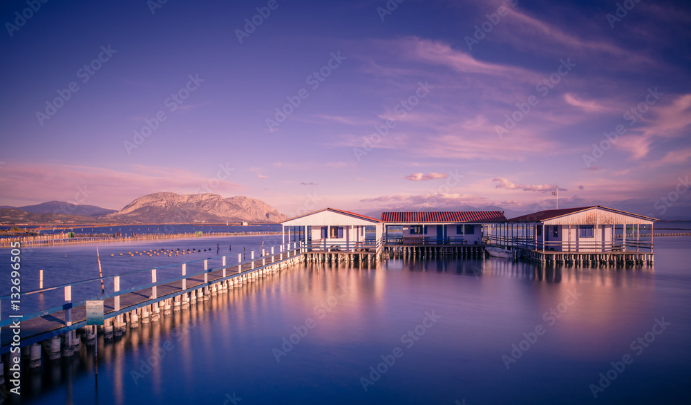 Small fishing houses on stilts on the lake Mesologgi, Greece