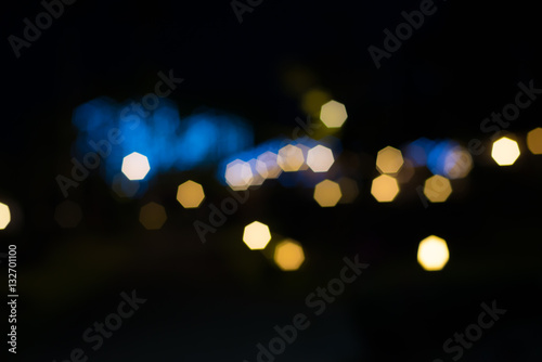Colorful abstract bokeh background at the night © karnmanic