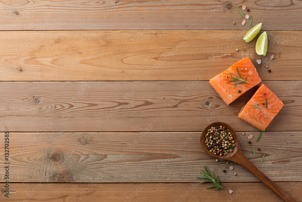 Beautiful composition of fresh salmon fillet with rosemary, salt Beautiful composition of fresh salmon fillet with rosemary, salt